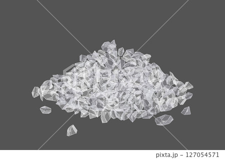 Pile of coarse salt crystals forming a small mound on gray background 127054571