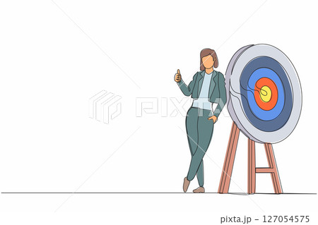 Continuous one line drawing happy businesswoman or manager is standing or leaning the target with thumbs up gesture. Arrow hit the target exactly. Single line draw design vector graphic illustration 127054575
