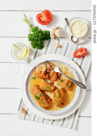 cabbage rolls with quinoa and ground meat filling 127056092