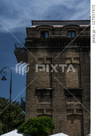 The facade of an old brick building in Batumi, Georgia 127057472