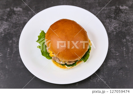 Homemade hamburgers on a plate 127059474