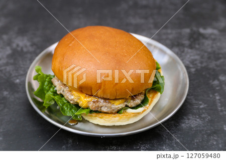 Homemade hamburgers on a plate 127059480