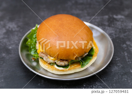 Homemade hamburgers on a plate 127059481