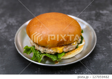 Homemade hamburgers on a plate 127059482