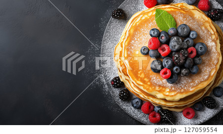 pancakes with fresh berries. Healthy morning breakfast. 127059554