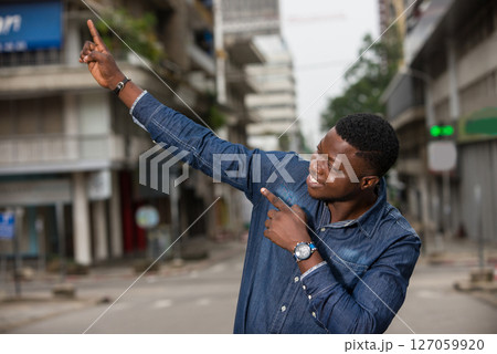 portrait of young african man, smiling. portrait of young african man, smiling. 127059920