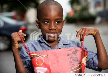 close-up of little boy, smiling. close-up of little boy, smiling. 127059924