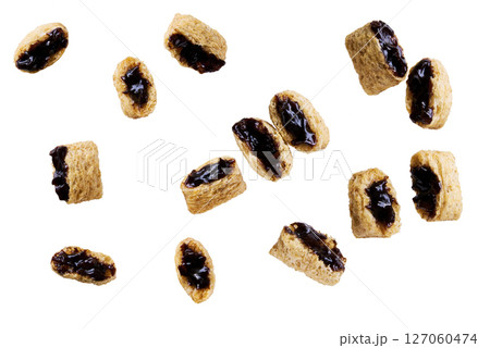 corn pads filled with chocolate cream isolated on white background. corn pads filled with chocolate cream isolated on white background. 127060474