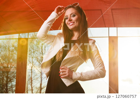 Young woman having fun on sunny day. Young woman having fun on sunny day. 127060757