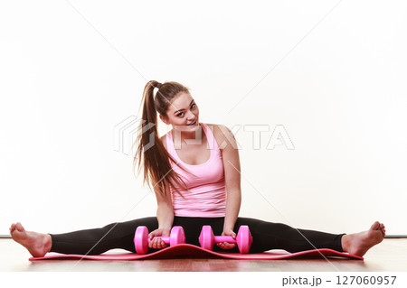 Cheerful girl liftingweights Cheerful girl liftingweights 127060957