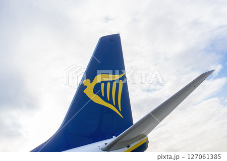 3 January - Porto, Portugal: White-blue-yellow aircraft tail with Ryanair logo 127061385