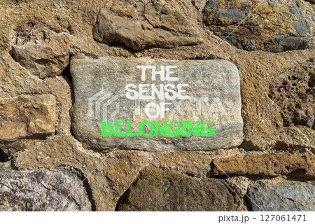 The sense of belonging symbol. Concept words The sense of belonging on beautiful grey stone. Beautiful stone wall background. Business and the sense of belonging concept. Copy space. The sense of belonging symbol. Concept words The sense of belonging on beautiful grey stone. Beautiful stone wall background. Business and the sense of belonging concept. Copy space. 127061471