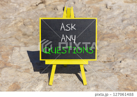 Ask any questions symbol. Concept words Ask any questions on beautiful black yellow blackboard. Beautiful stone background. Business ask any questions concept. Copy space. 127061488