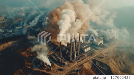 Aerial View of an Industrial Complex with Smoke Plumes Aerial View of an Industrial Complex with Smoke Plumes 127063425