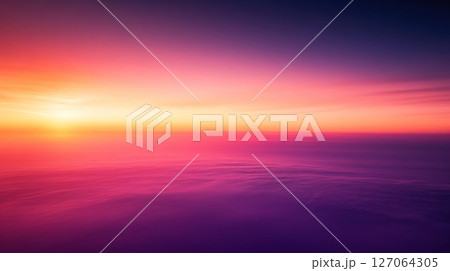 Vibrant Sunset Over a Sea of Clouds Vibrant Sunset Over a Sea of Clouds 127064305
