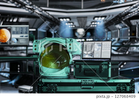 Space helmet next to laptop in spaceship showing core performance diagnostics during orbital flight. Astronaut equipment prepared for planetary expedition and notebook displaying spaceship readouts Space helmet next to laptop in spaceship showing core performance diagnostics during orbital flight. Astronaut equipment prepared for planetary expedition and notebook displaying spaceship readouts 127068409