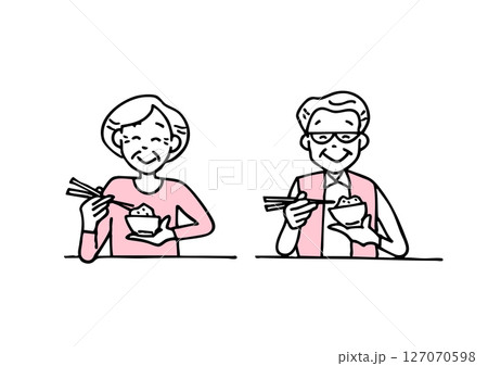 箸でご飯を食べるシニアの夫婦 127070598