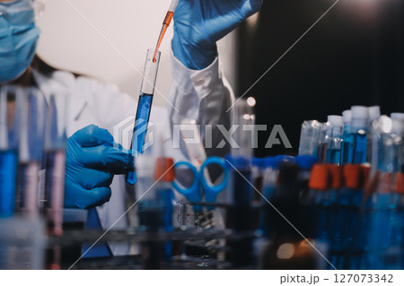 scientist working at the laboratory scientist working at the laboratory 127073342