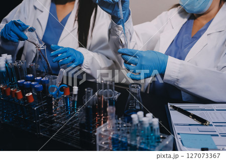 scientist working at the laboratory scientist working at the laboratory 127073367