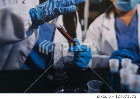 scientist working at the laboratory scientist working at the laboratory 127073372