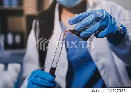 scientist working at the laboratory scientist working at the laboratory 127073374
