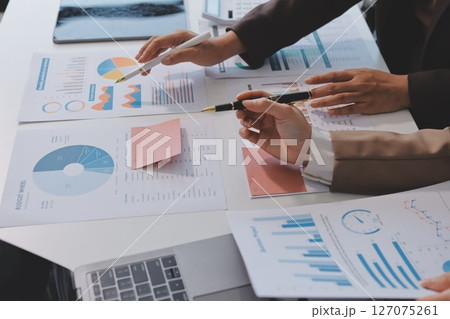 Accounting company provide finance and taxation planning for profitable cash flow, Auditor and accountant team working in office, analyze financial data and accounting record with calculator.Insight Accounting company provide finance and taxation planning for profitable cash flow, Auditor and accountant team working in office, analyze financial data and accounting record with calculator.Insight 127075261