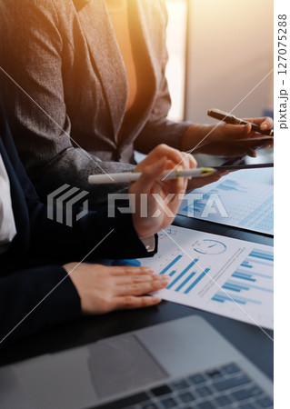 Accounting company provide finance and taxation planning for profitable cash flow, Auditor and accountant team working in office, analyze financial data and accounting record with calculator.Insight Accounting company provide finance and taxation planning for profitable cash flow, Auditor and accountant team working in office, analyze financial data and accounting record with calculator.Insight 127075288