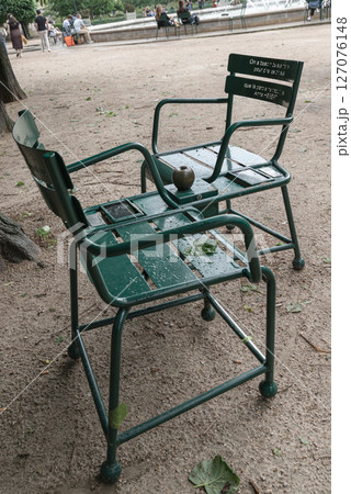these loveseats are created from two chairs placed opposite each other and named "The Confidants". 127076148