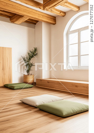 A serene meditation space with cushions and natural light in a minimalistic interior design A serene meditation space with cushions and natural light in a minimalistic interior design 127077382