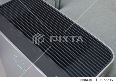 air purifier technology clean dust pm 2.5 in living room inside home for healthy care 127078245