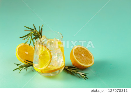 Summer cool transparent refreshing drink with ice. 127078811