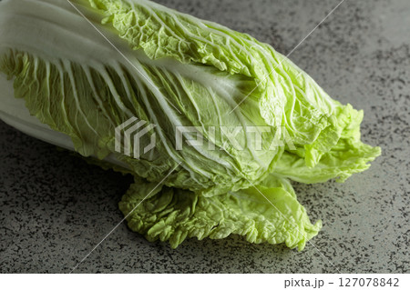 Fresh Chinese cabbage on a stone table. 127078842