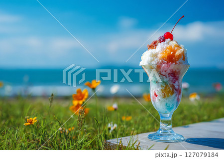 海の見えるカフェのテラスで食べるかき氷　AI画像 127079184