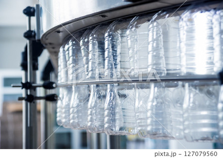 The plastic bottle blowing machine. PET preforms for blowing of plastic bottles The plastic bottle blowing machine. PET preforms for blowing of plastic bottles 127079560