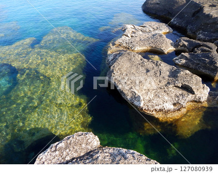 Rocky shore of the Caspian Sea. 127080939