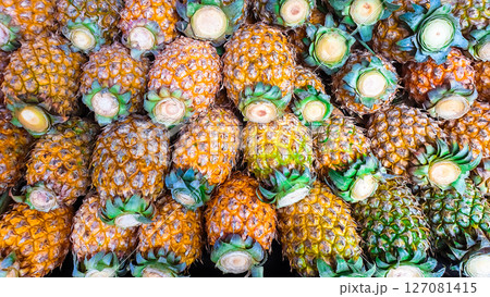 Fresh pineapples are sold in the fresh market with texture 127081415