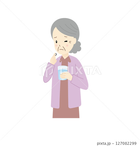 薬を飲むのを苦労するシニア女性 127082299