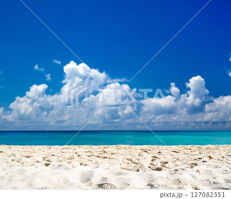 Beach and sea. Tropical beach. Blue sea and blue sky. Blue sky over calm sea 127082351