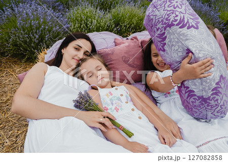 A beautiful lavender field and a comfortable bed for relaxation 127082858