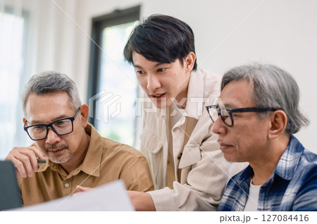 Asian Instructor Teaching Senior in Software Programming and Training Collaboration Asian Instructor Teaching Senior in Software Programming and Training Collaboration 127084416