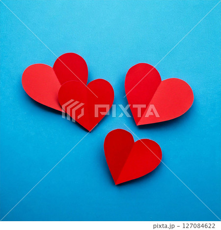 Red paper hearts hearts on blue background. top view. valentines concept. AI Generated. 127084622