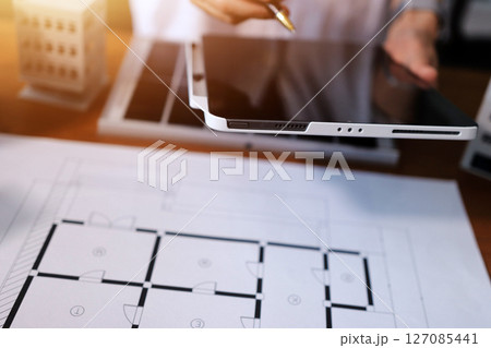 Discussion among businesspeople on the latest developments in solar cell panel technology and Solar Energy Environment city Concept. Discussion among businesspeople on the latest developments in solar cell panel technology and Solar Energy Environment city Concept. 127085441
