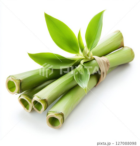 Fresh bamboo stalks with vibrant green leaves, showcasing natural beauty and tranquility 127088098