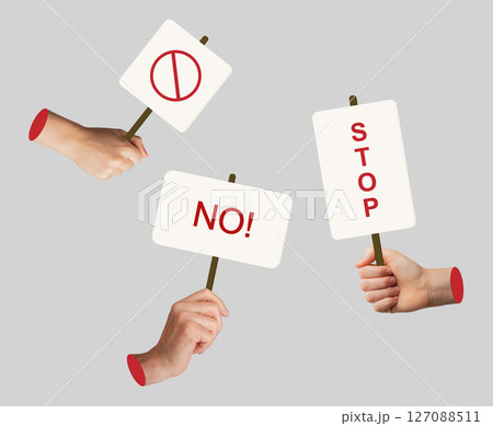 Protester holding red sign, symbolizing resistance and revolution. Political demonstration, rally Protester holding red sign, symbolizing resistance and revolution. Political demonstration, rally 127088511