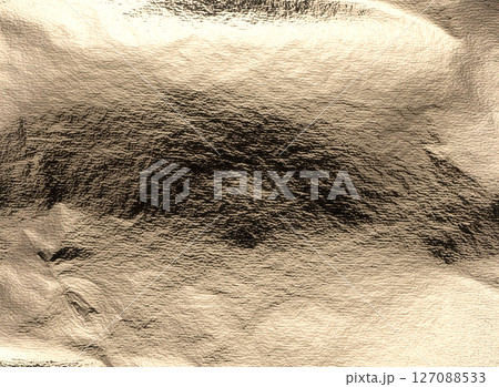Gold metallic texture, shiny surface with intricate folds and crinkles. Smooth finish, reflecting 127088533