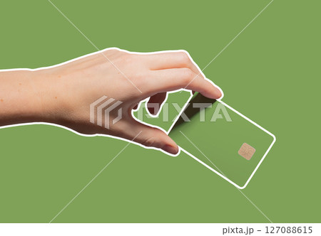 Colorful business concept. Hand holding bright plastic bankcard with chip in closeup for credit, 127088615