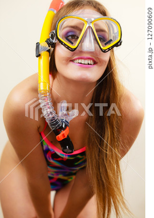 Woman with snorkeling mask having fun Woman with snorkeling mask having fun 127090609