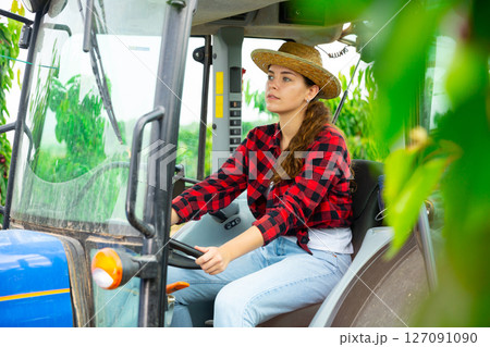Portrait of young female farmer working on field Portrait of young female farmer working on field 127091090