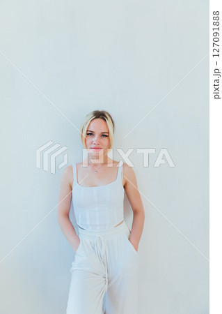 Portrait of Beautiful Slender Woman in Summer Clothes on White Background Portrait of Beautiful Slender Woman in Summer Clothes on White Background 127091888