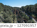 View on the canal exiting La Bolera Reservoir built on the Guadalentin River, near the municipality of Pozo Alcon, in the province of Jaen, Spain. 127091957